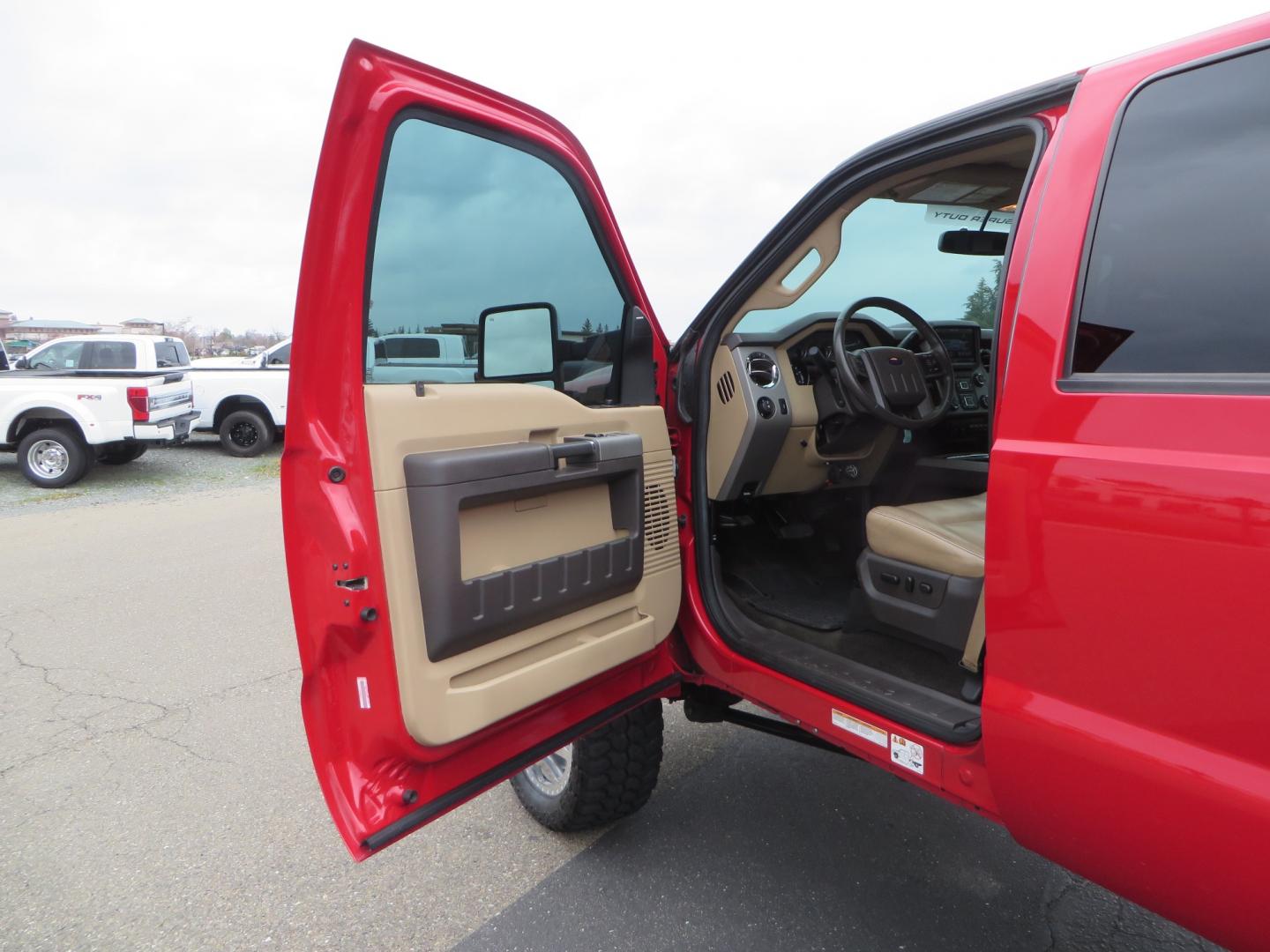 2014 Red /TAN Ford F450 Super Duty Crew Cab Lariat Crew Cab 4WD (1FT8W4DT7EE) with an V8 Turbo Diesel 6.7 Liter engine, Automatic 6-Spd w/SelectShift transmission, located at 2630 Grass Valley Highway, Auburn, CA, 95603, (530) 508-5100, 38.937893, -121.095482 - Wow!! 14 F450 sitting on Icon Vehicle Dynamics suspension, 24" American Force wheels, 37" tires, Rough Country back up leds, Light bar, Window tint, Smoked tail lights 3rd brake light, cab lights, and marker lights, Air bags with compressor, and train horns. Must see this head turner! - Photo#23